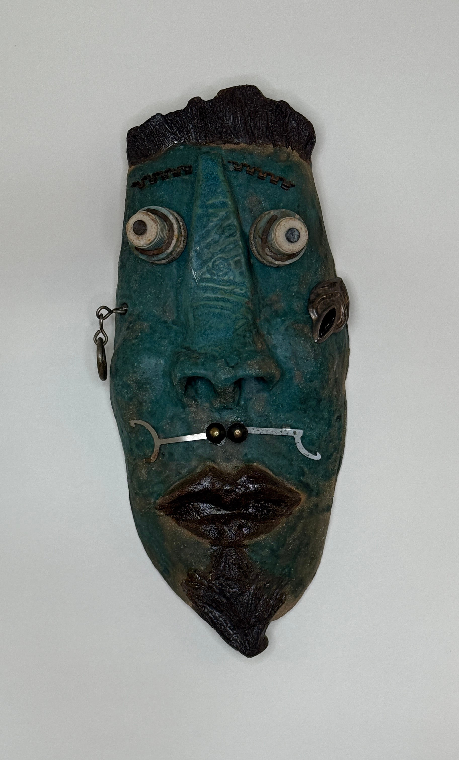 Armando Warbucks — found-object mask by Jill Drllevich
