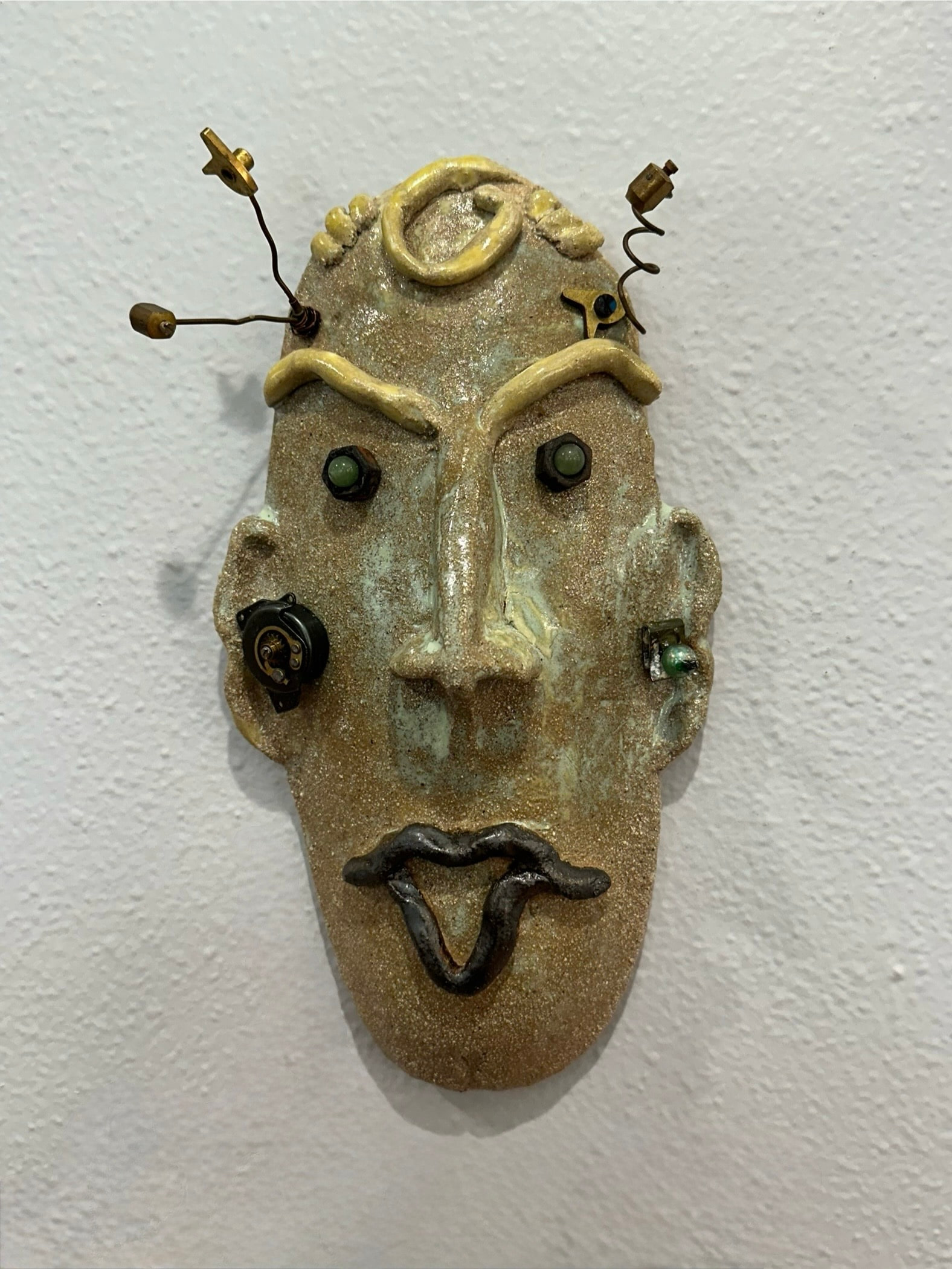Briccio Green — found-object mask by Jill Drllevich